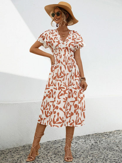 Printed V-Neck Short Sleeve Dress Carauana Store