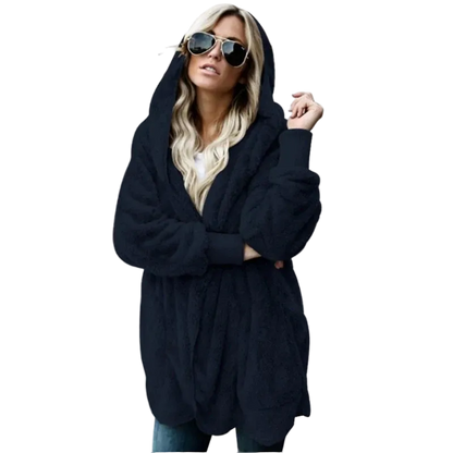 Woman wearing a blue hoodie on a white background