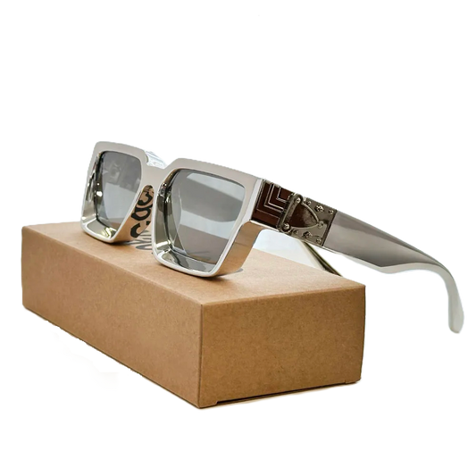 Carauana Millionaire GO with reflective lenses on a brown box