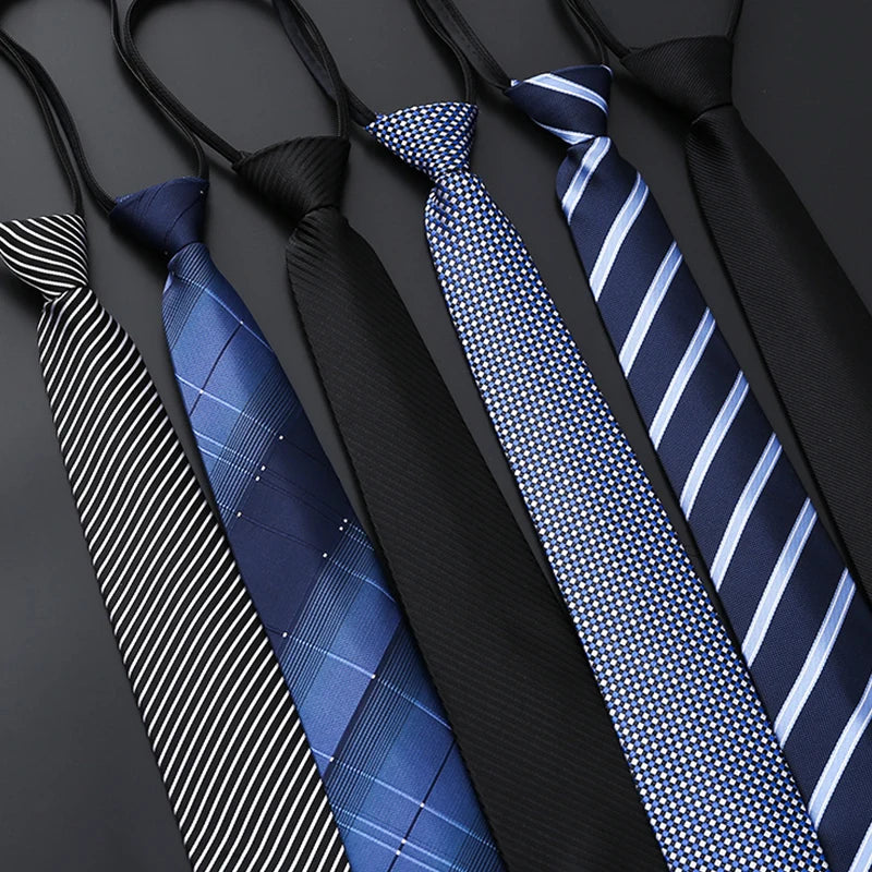 Collection of various ties on a dark background