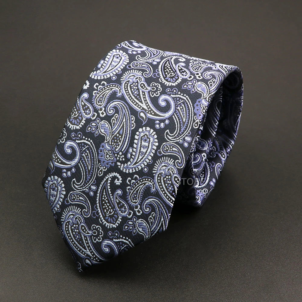 Paisley patterned tie on a dark background