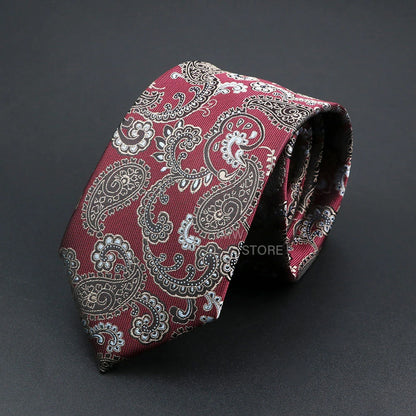 Red paisley patterned tie on a dark gray background