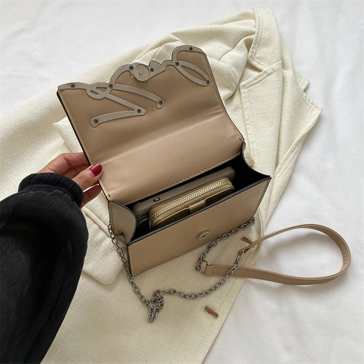 CaRaUaNa Karl Clutch Bag | showcases meticulous Italian leather