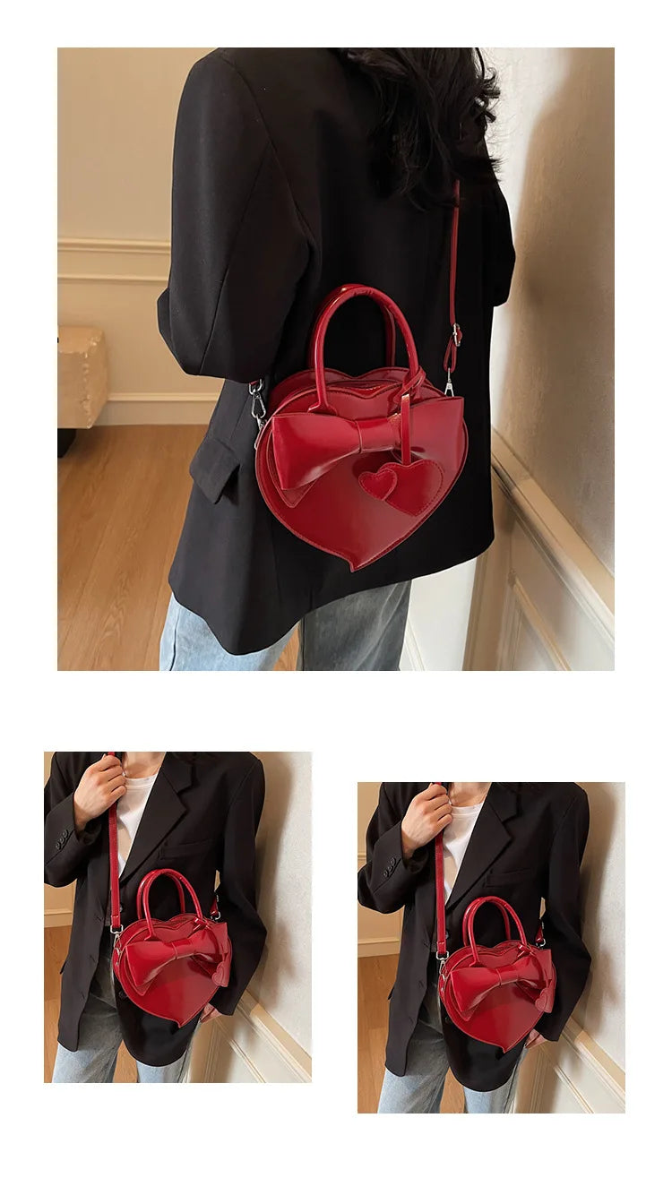carauana-lovely-shoulder-bag-red heartwith a bow detail worn by a person indoors.